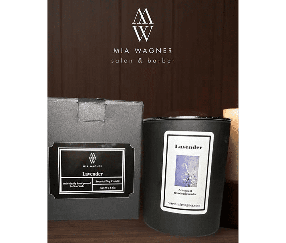 Lavender-scented candle and box with Mia Wagner Salon & Barber logo.